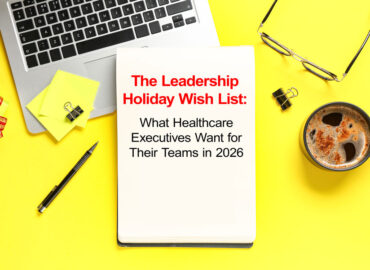 Leadership-Holiday-Wish-List Flat lay image of a notebook titled “The Leadership Holiday Wish List: What Healthcare Executives Want for Their Teams in 2026” on a bright yellow desk with a laptop, coffee mug, glasses, pen, sticky notes, and a small gift.