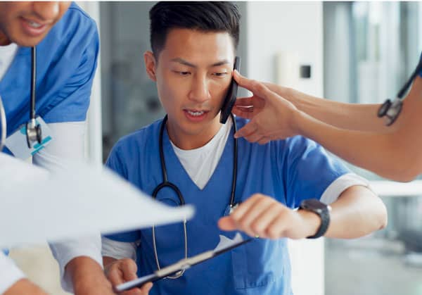 Nurses reviewing online continuing education requirements for nursing contact hours