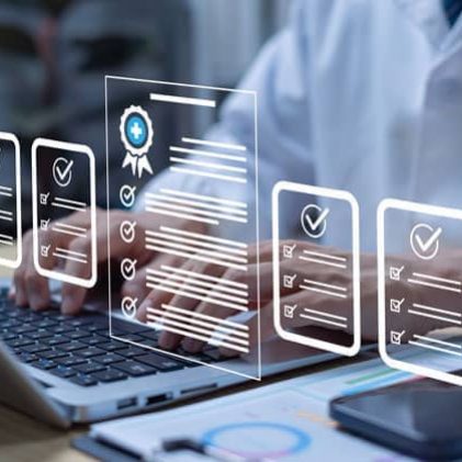 Healthcare professional reviewing digital checklists and accreditation documents on a laptop for strategic continuing education planning